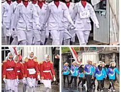 Peserta Gerak Jalan Umum Tambakrejo meski diguyur hujan tetap semangat sampai garis Finish