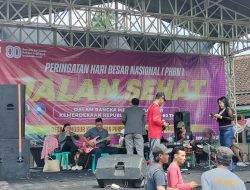 Jalan sehat peringatan HUT RI ke-80 Desa Punggur dengan hiburan Orkestra.